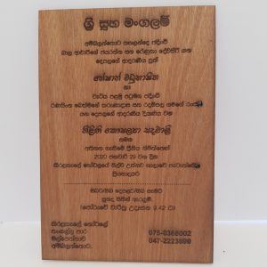 "Economy option: Laser-engraved wooden wedding invitation. This budget-friendly choice features intricate laser engraving on wood, providing an affordable yet stylish way to announce your special day."