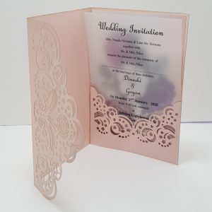 "Trifold star laser-cut folder with luxurious velvet invitations. This exquisite invitation set features a trifold design adorned with intricate star-shaped laser cuts, enclosing sumptuous velvet invitations that add a touch of elegance and allure to your special event."